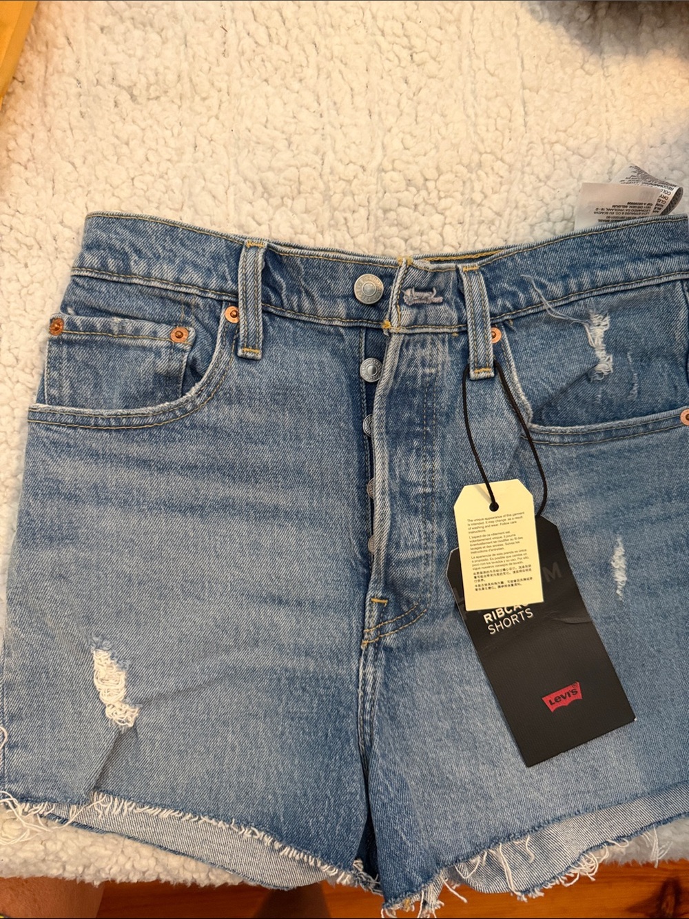 Levi's RIBCAGE Light Blue High-Rise Distressed Denim Shorts